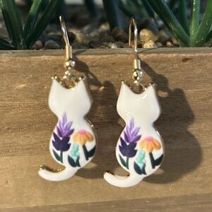 CAT Pierced Enamel Earrings with Floral Design.